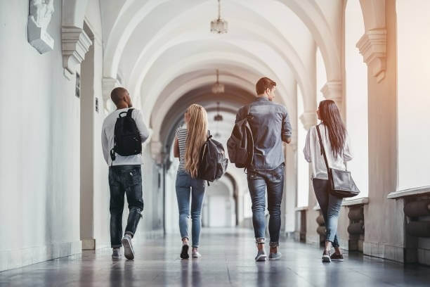 Student Walking in Corridor